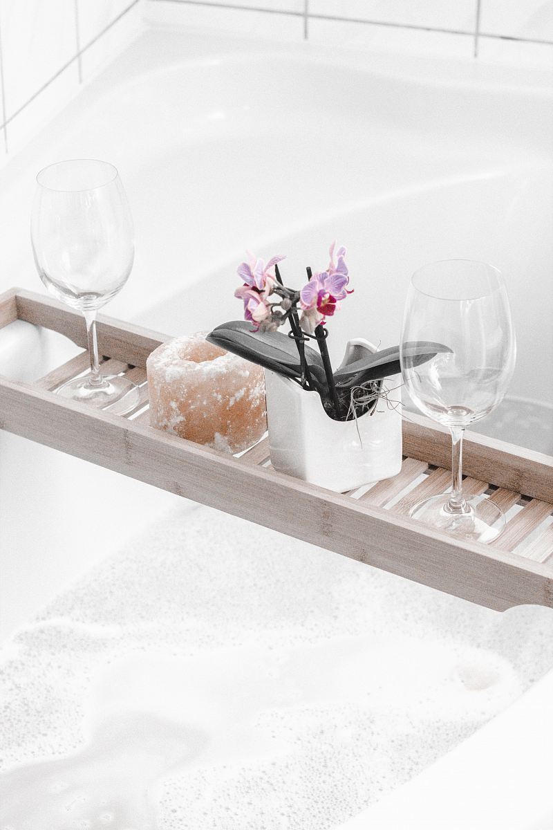 two wine glasses on tray