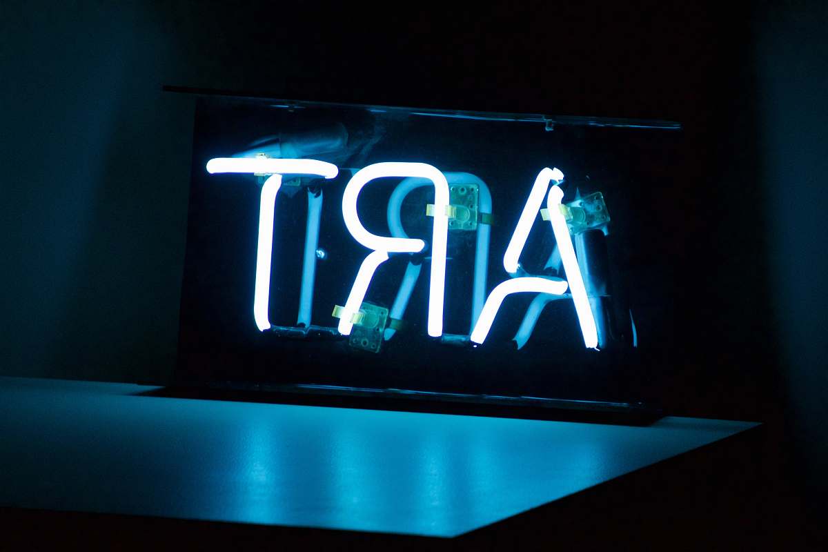 neon blue Art neon sign turned on sign
