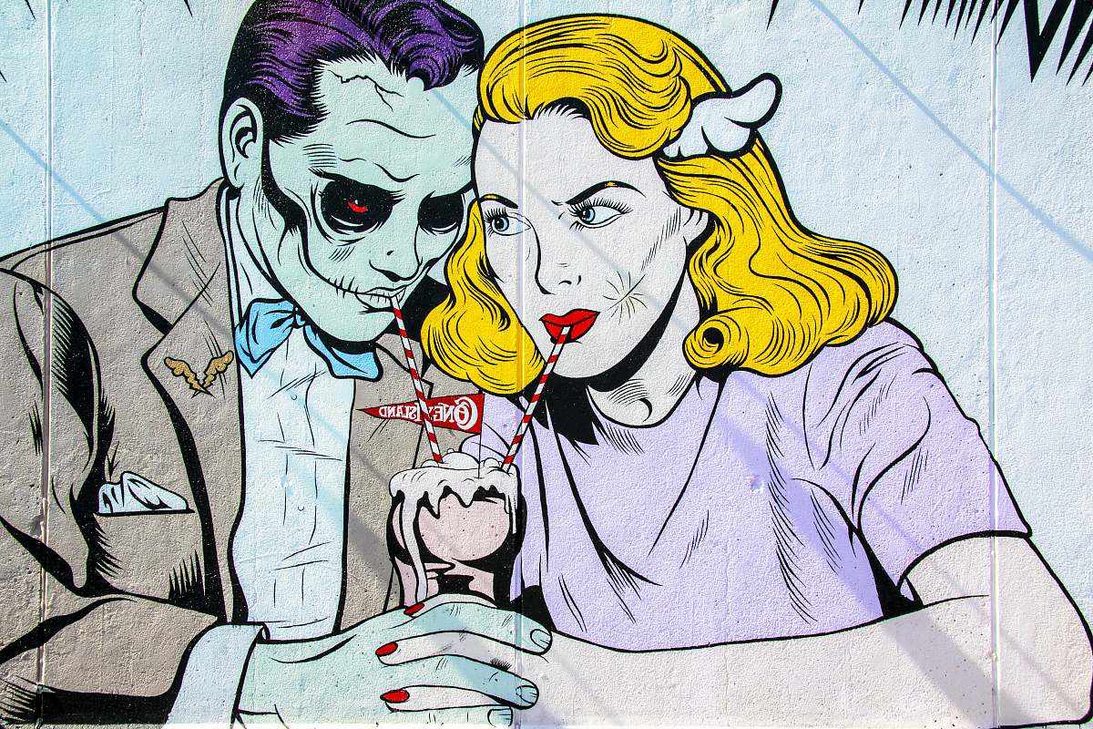 graffiti man and woman character drinking photo coney island