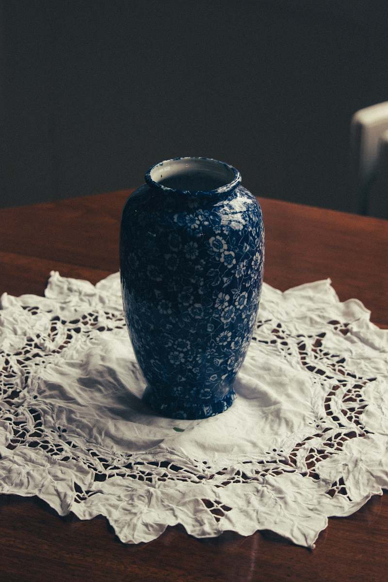 porcelain shallow focus photo of blue and white floral ceramic vase pottery