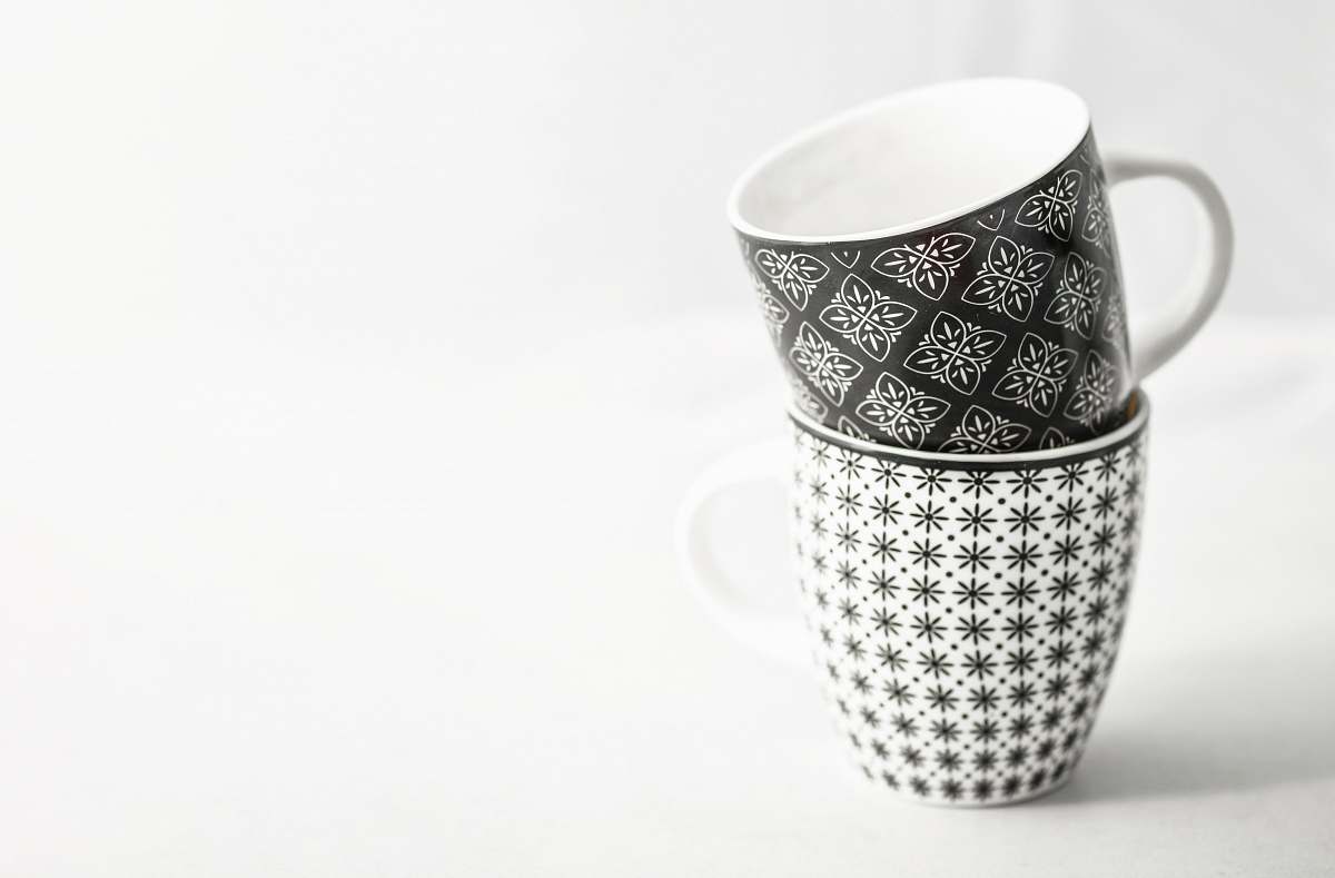 pottery two white-and-black mugs black-and-white