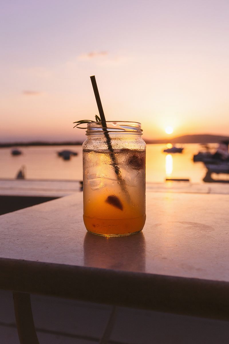 clear glass mason jar filled with juice