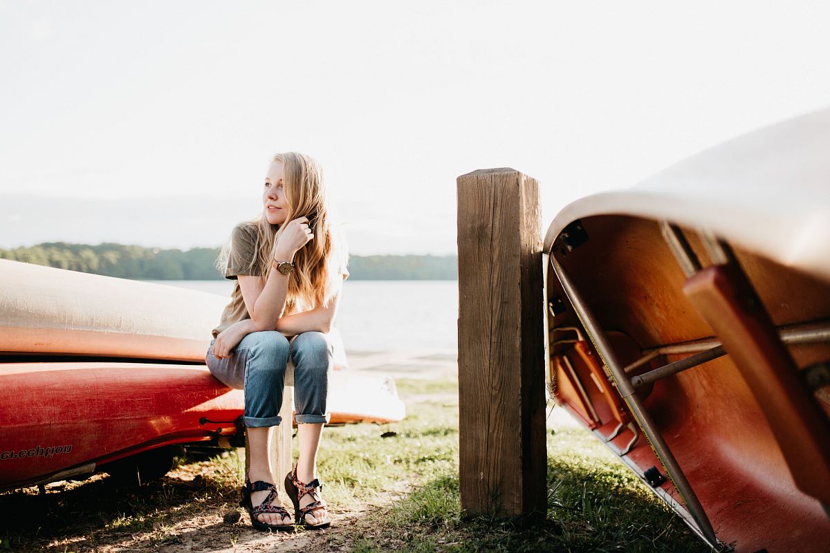 woman seating on boat