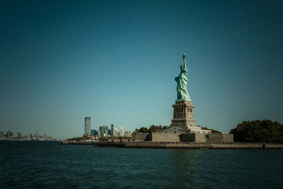 statue Liberty Statue during clear blue sky sculpture