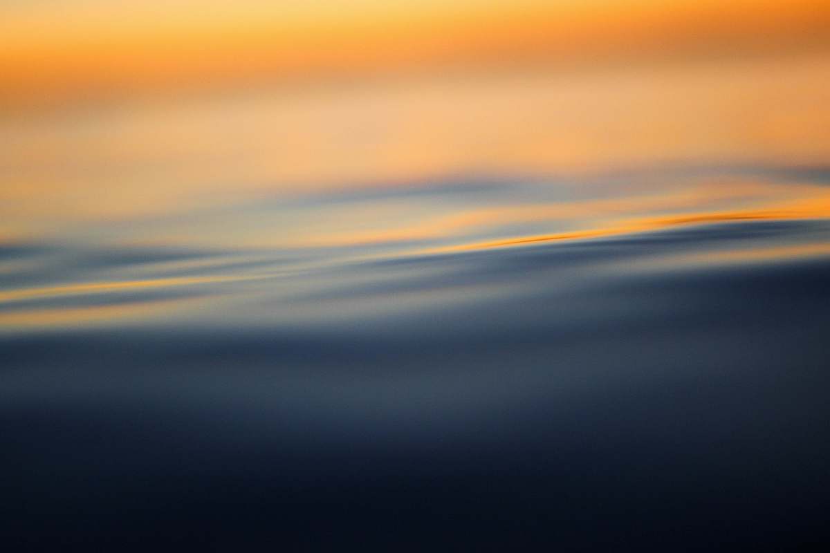 water calm water sunset