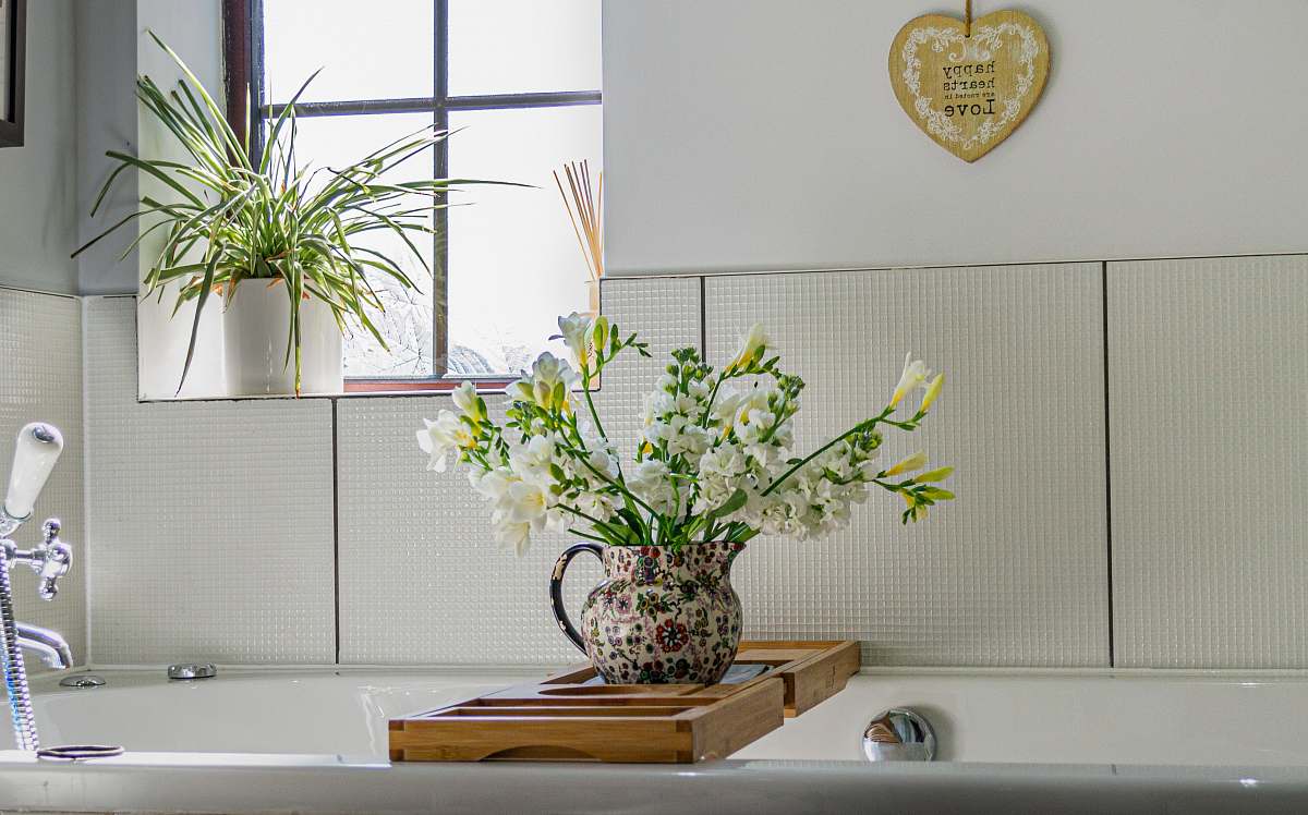 pottery white petaled flower jar