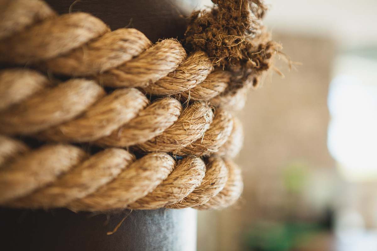 brown selective focus photography of brown rope detail
