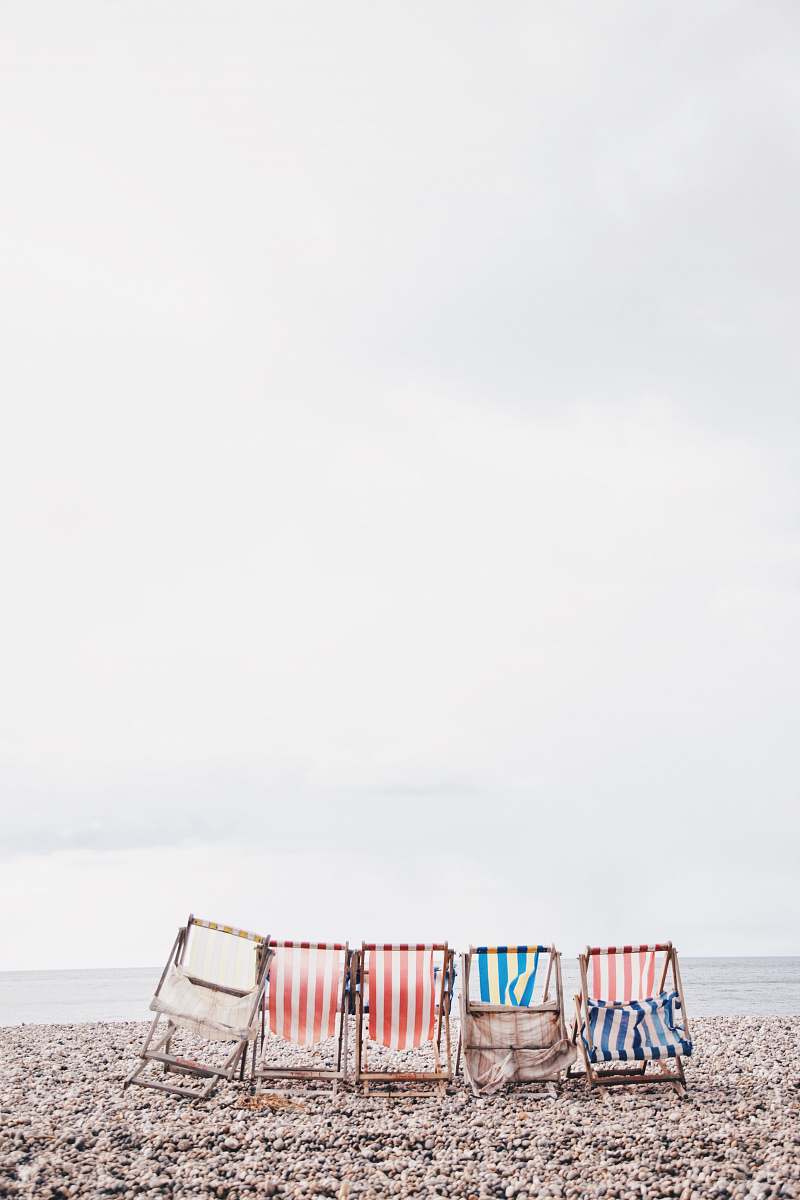 beach five chairs near costline chair