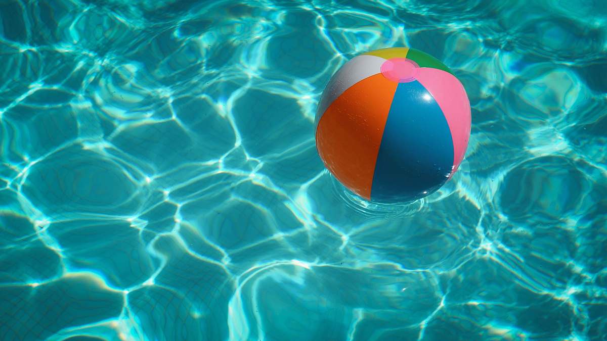 water white and multicolored beach ball pool