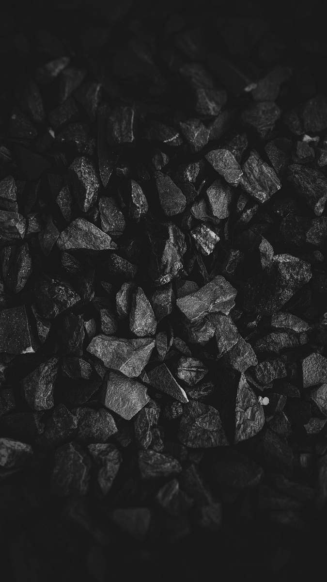 black grayscale photo of stone grey