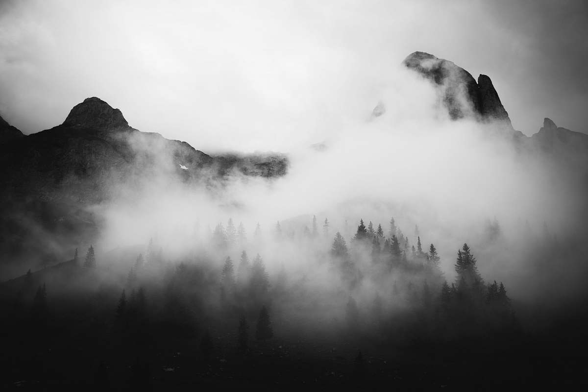 grey mountain with fogs photo mist
