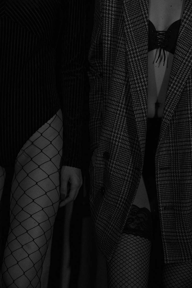 person two woman standing in greyscale photography human