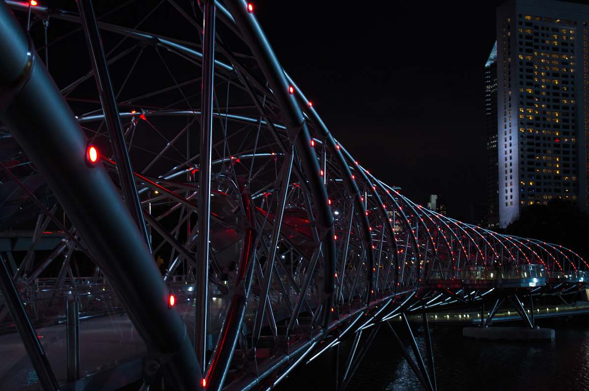 architecture gray Helix Bridge with red lights at nighttime singapore