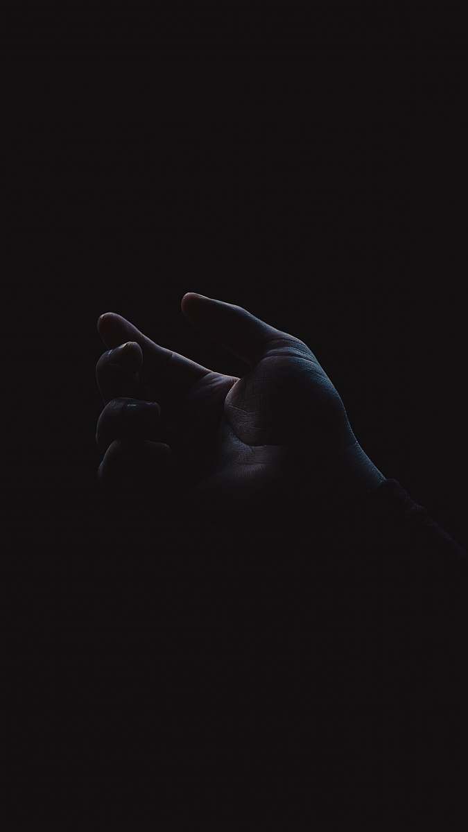 dark left person's palm hand