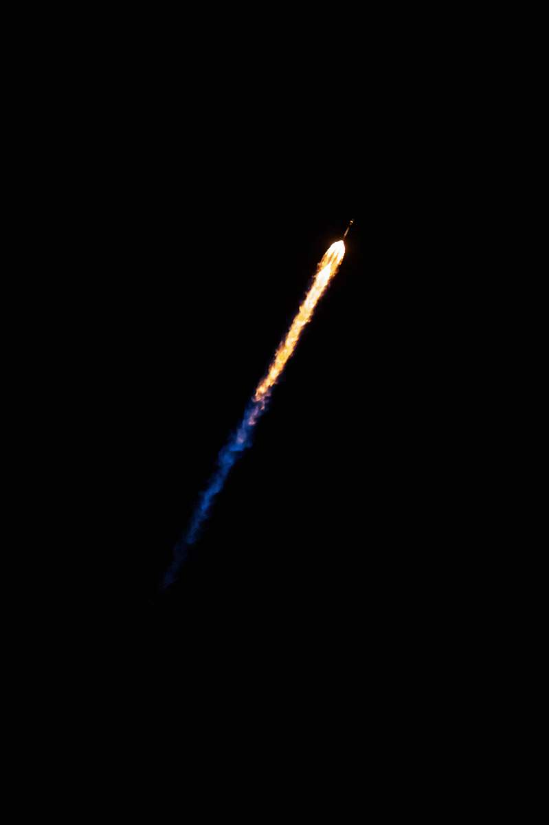 blue rocking flying in sky during night time yellow