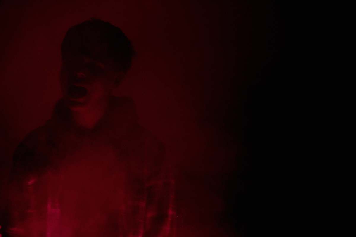 person man in red hooddie black