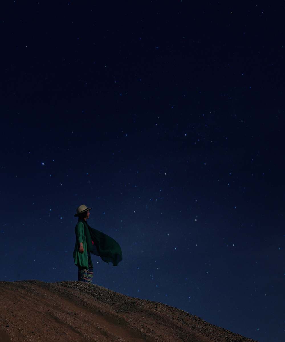 outdoors woman standing on desert night