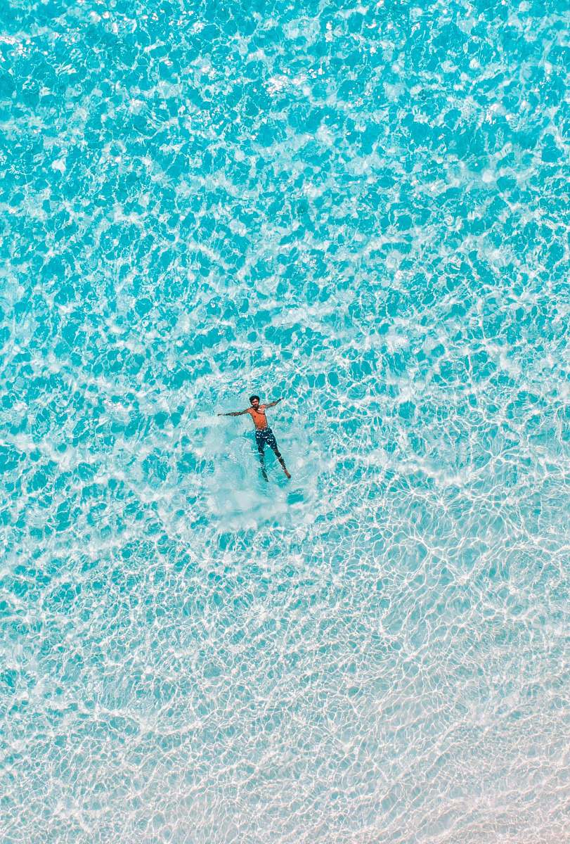 sea bird's eye view of man on body water nature