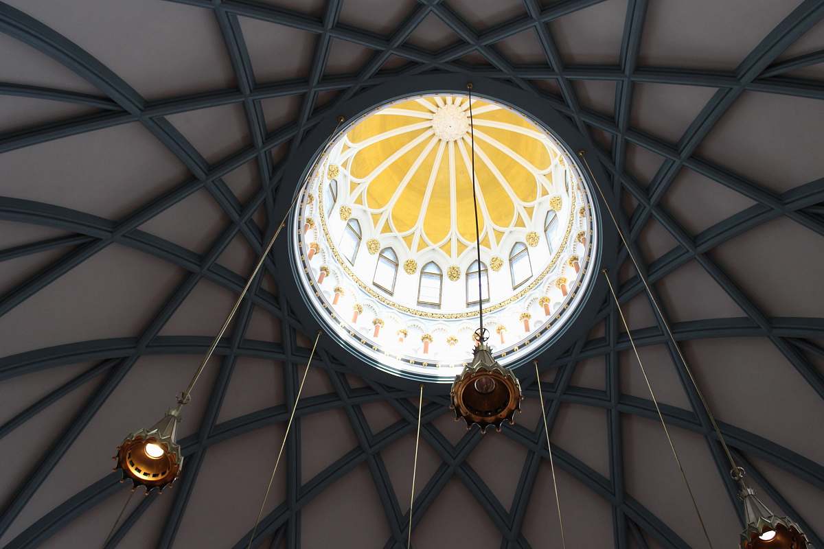 building photo of hanging pendant lamps on building ceiling dome