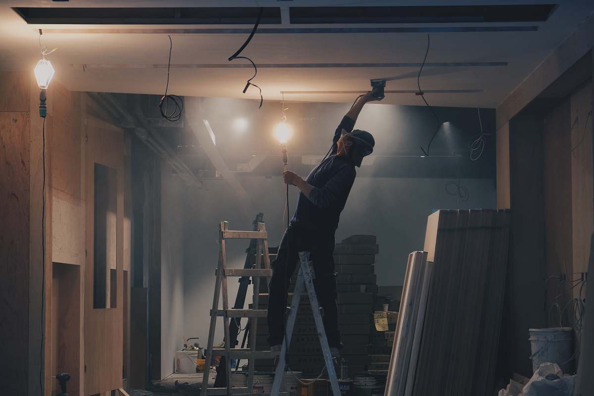 taiwan man on white ladder worker