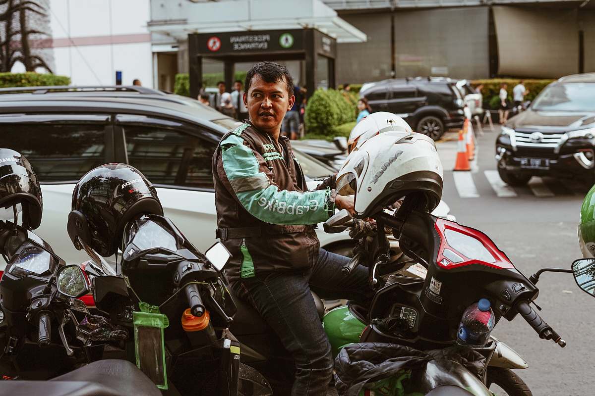 clothing man riding motorcycle apparel