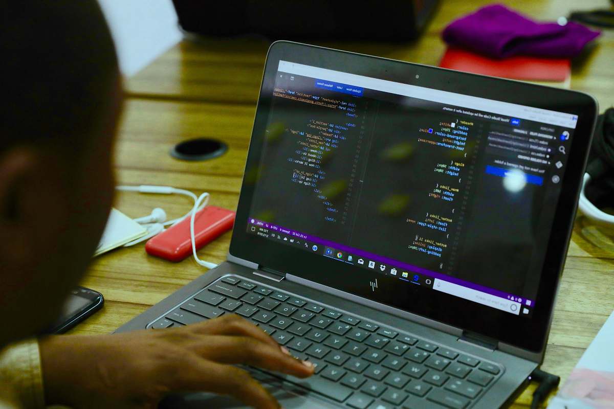 computer black HP laptop displaying C++ language lagos