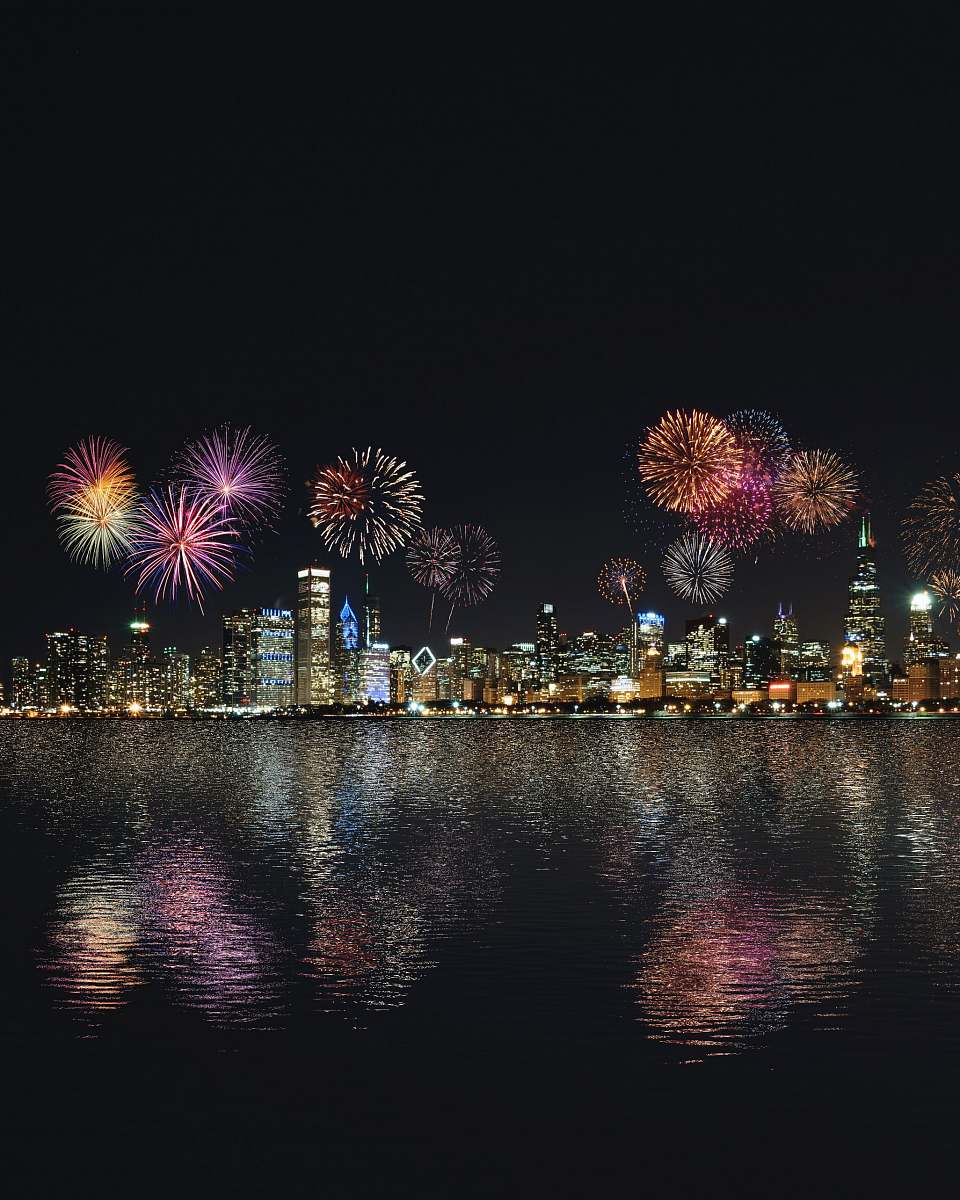 outdoors skyline buildings under fireworks display night