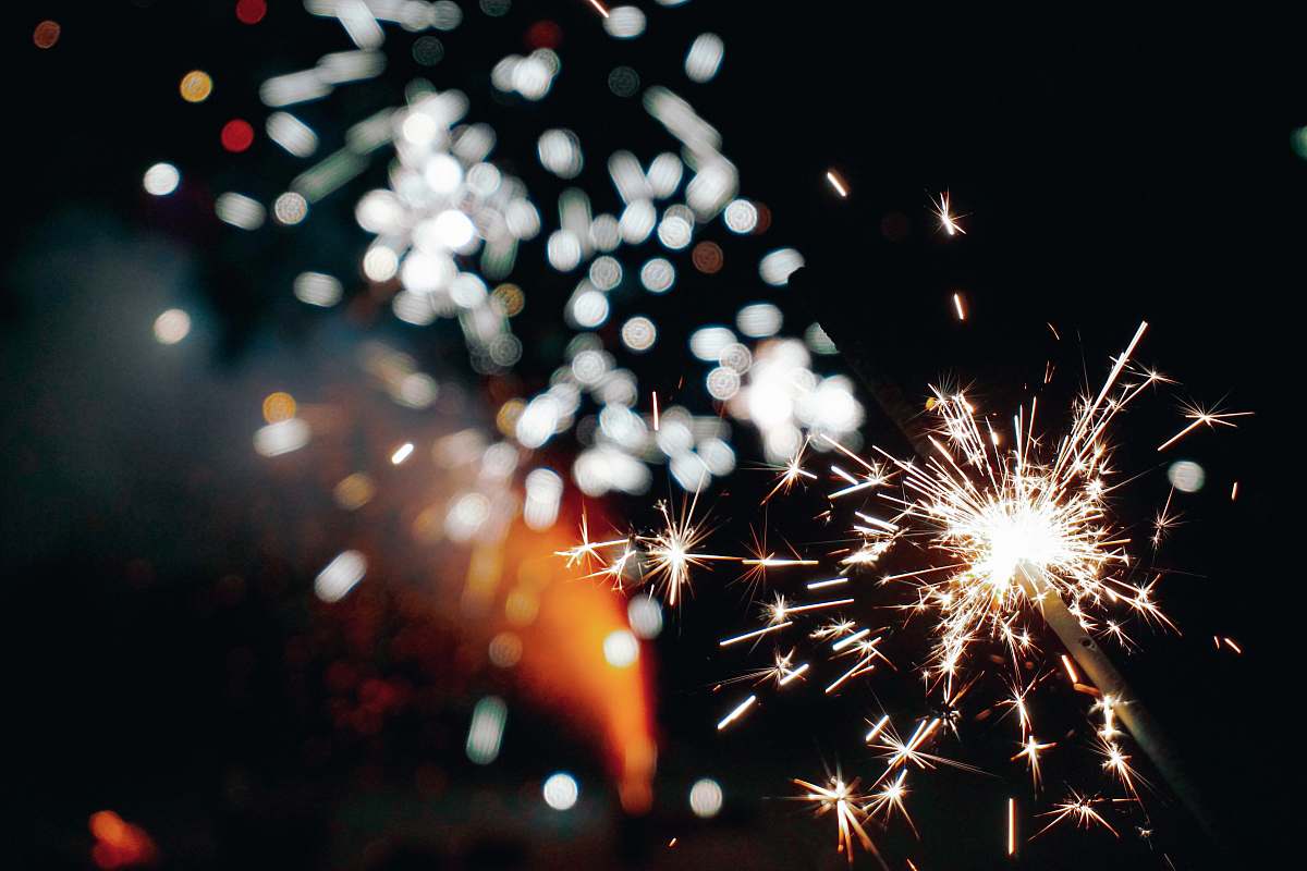 fireworks close up photo of lighted sparkler outdoors