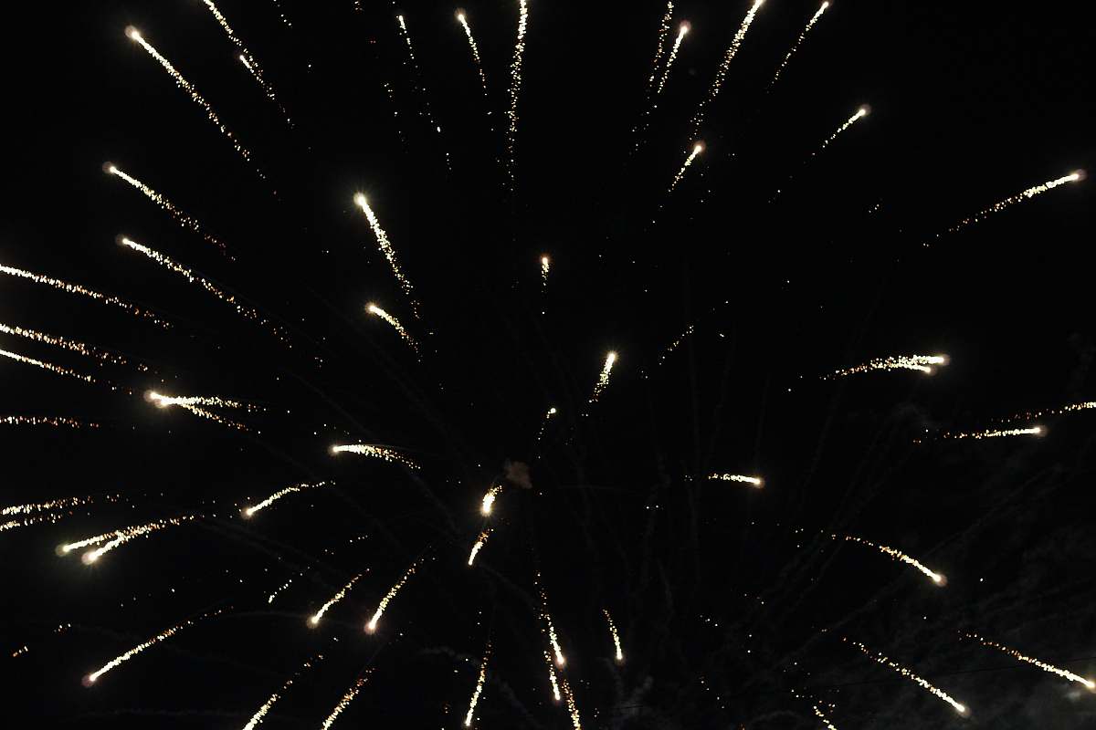 outdoors yellow fireworks during nighttime nature