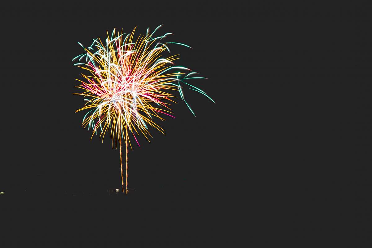 night yellow, blue, and red chrysanthemum firework fireworks