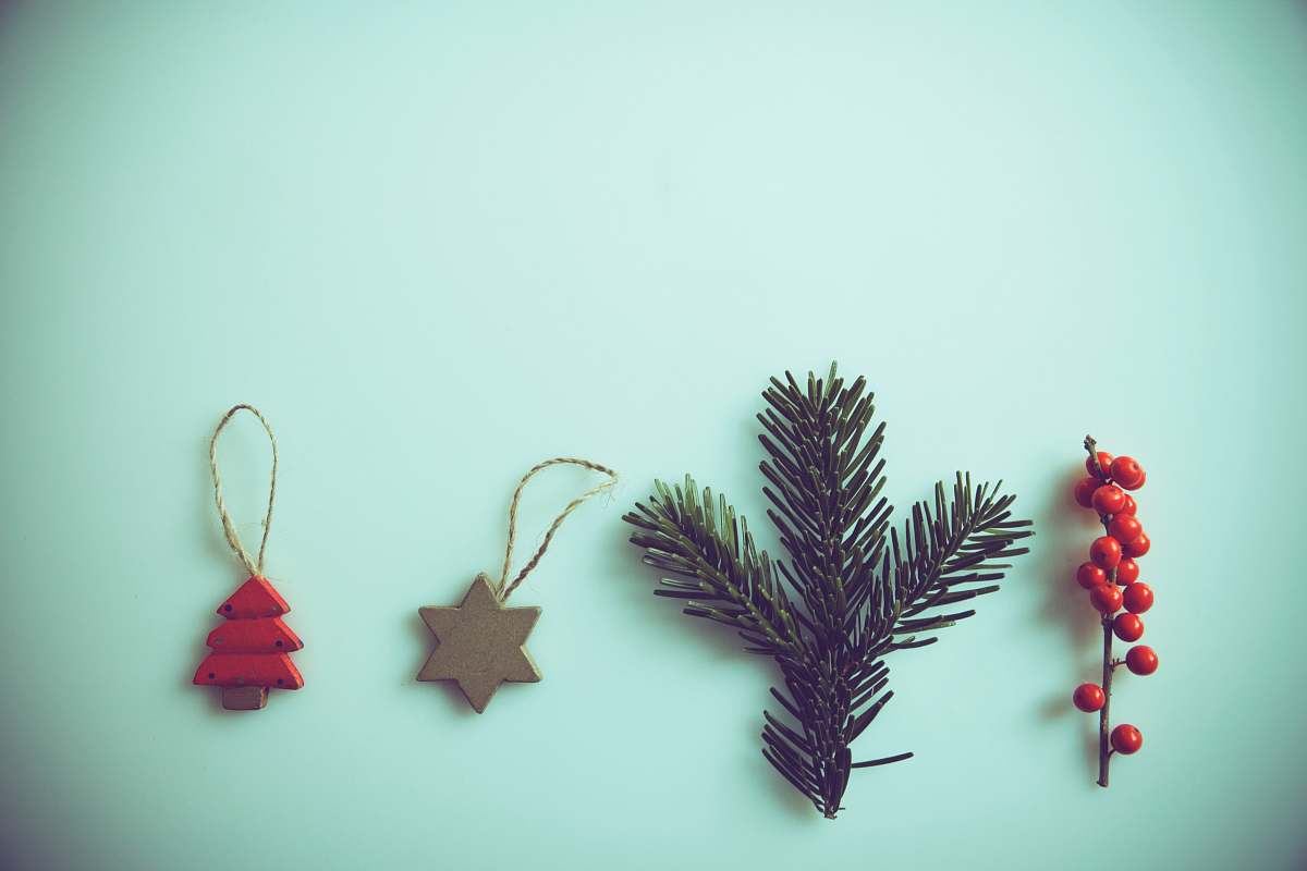tree red mistletoe, green pine spruce, and two ornaments ornament