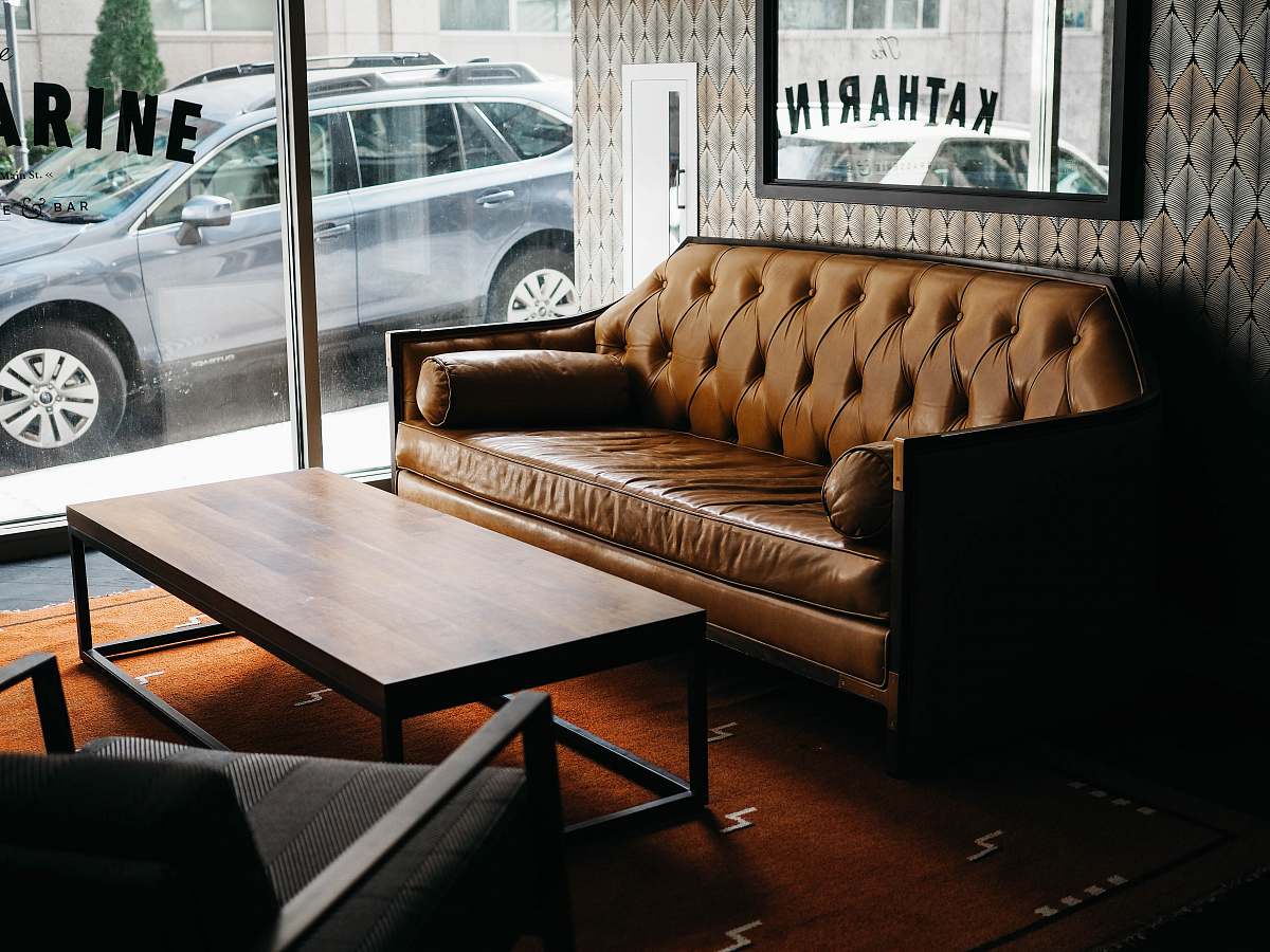 furniture gray SUV parked outside building couch