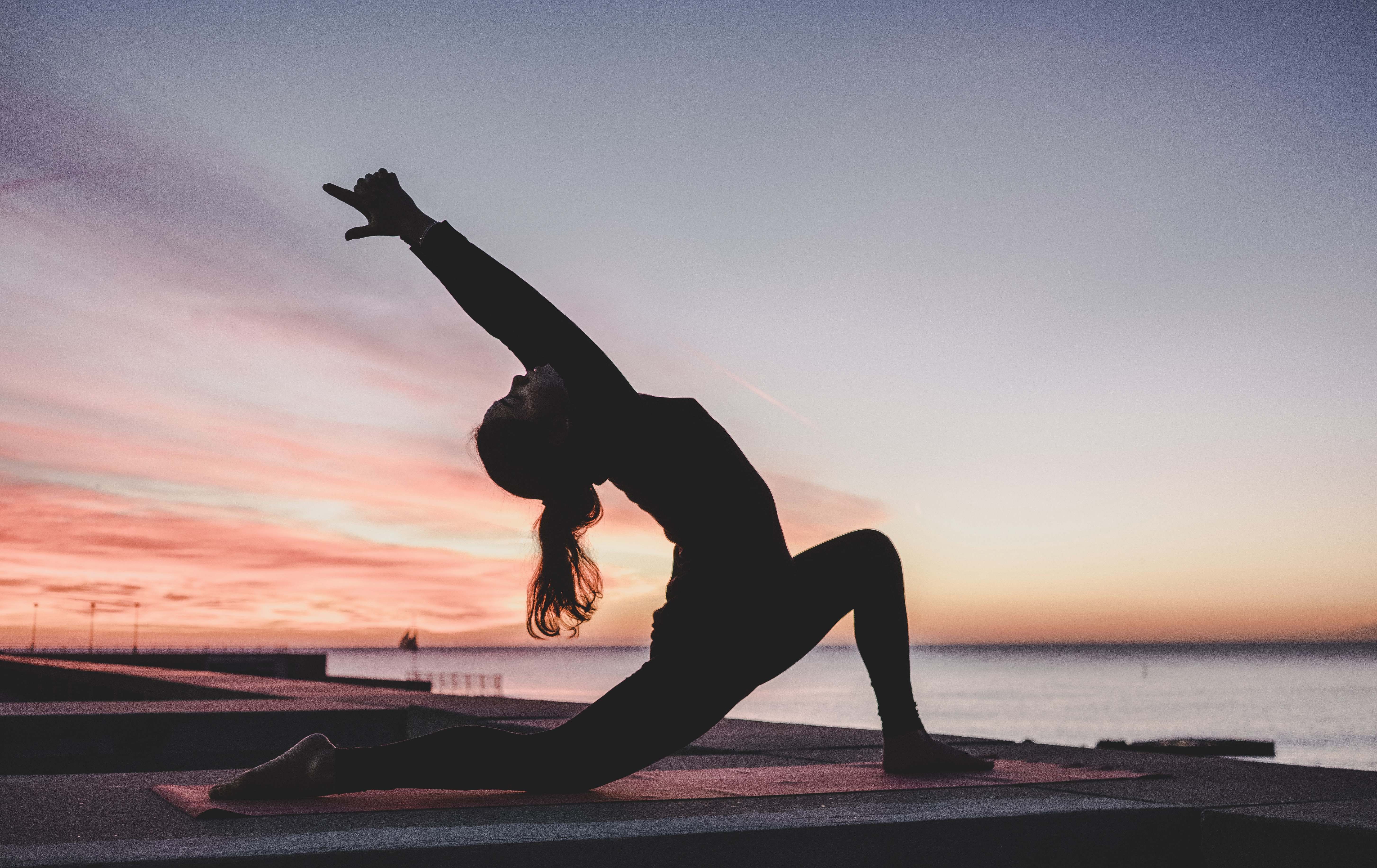 fitness-silhouette-photography-of-woman-doing-yoga-sport-sport-image image