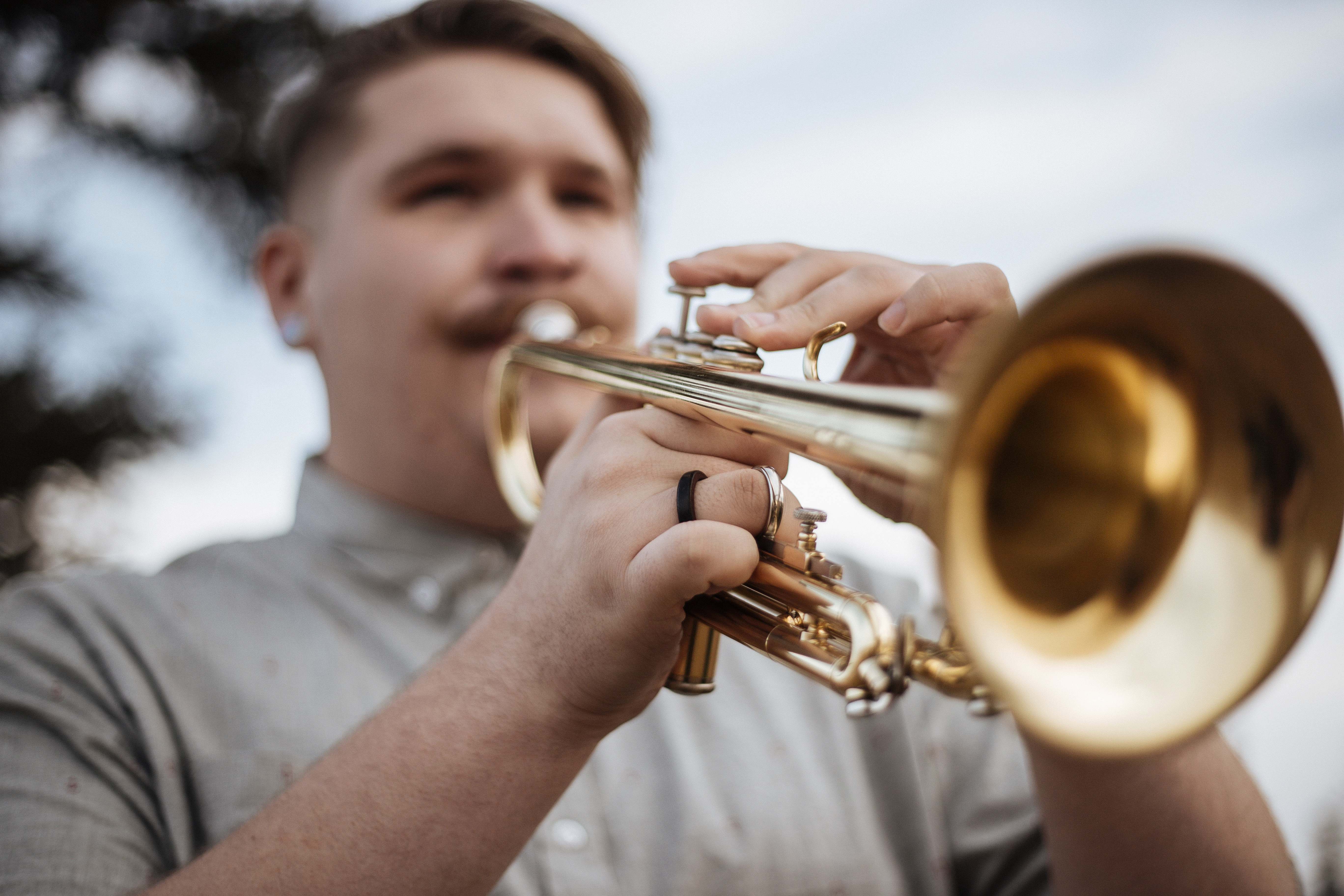 People Man Playing Trumpet Outdoors Musical Instrument Image Free Photo