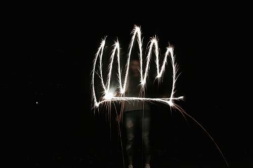 night person holding fireworks outdoors