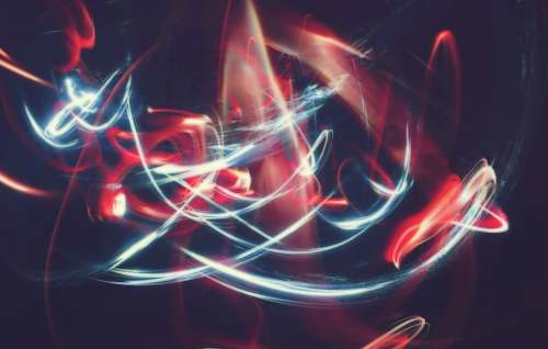 light time-lapsed photo of white and red light plasma