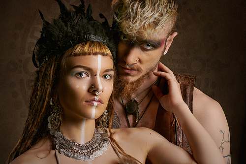 accessory close-up photography of woman and man jewelry