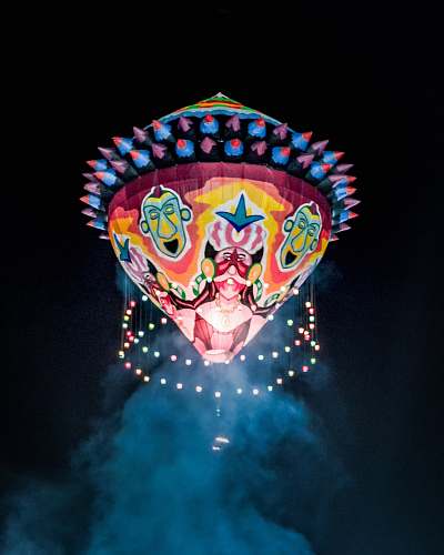 festival multicolored hot air balloon crowd