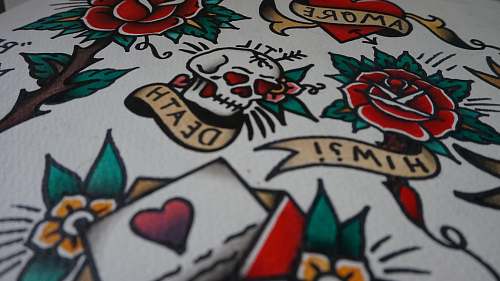 graffiti white, green, and red skull and flower print textile tattoo