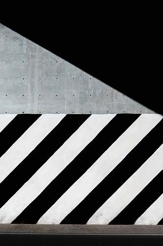 pattern white and black diagonal striped paint on wall abstract