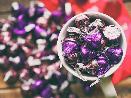 purple Hershey's Kisses in mug kisses