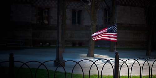 symbol USA flaglet on fence boston