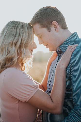 person male and female facing each other people