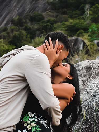 human man and woman kissing hug