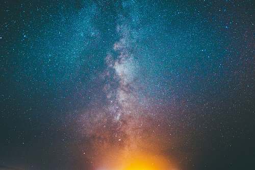 night blue, yellow, and purple starry sky during nighttime galaxy