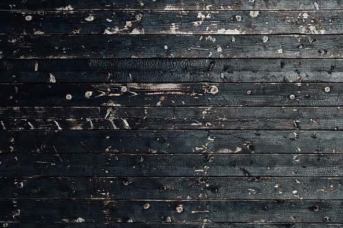 background closeup photography of black wooden parquet partition japan