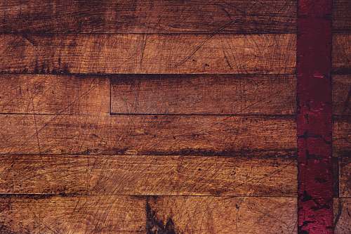 brown shallow focus photography of brown parquet flooring wood