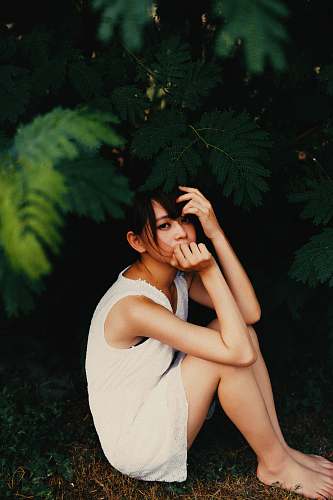 person woman sitting under tree human