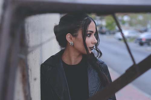 human woman wearing black notched lapel top woman