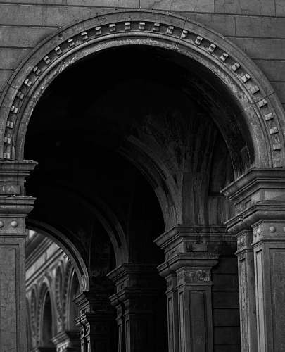 arch grayscale photography of building building